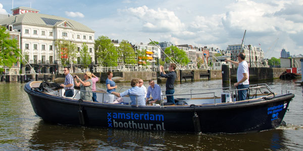 Open canal boat Amsterdam